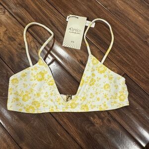 Leni swims bikini top